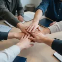 magnific__topdown-photo-of-a-software-team-around-a-meeting-__62656.webp